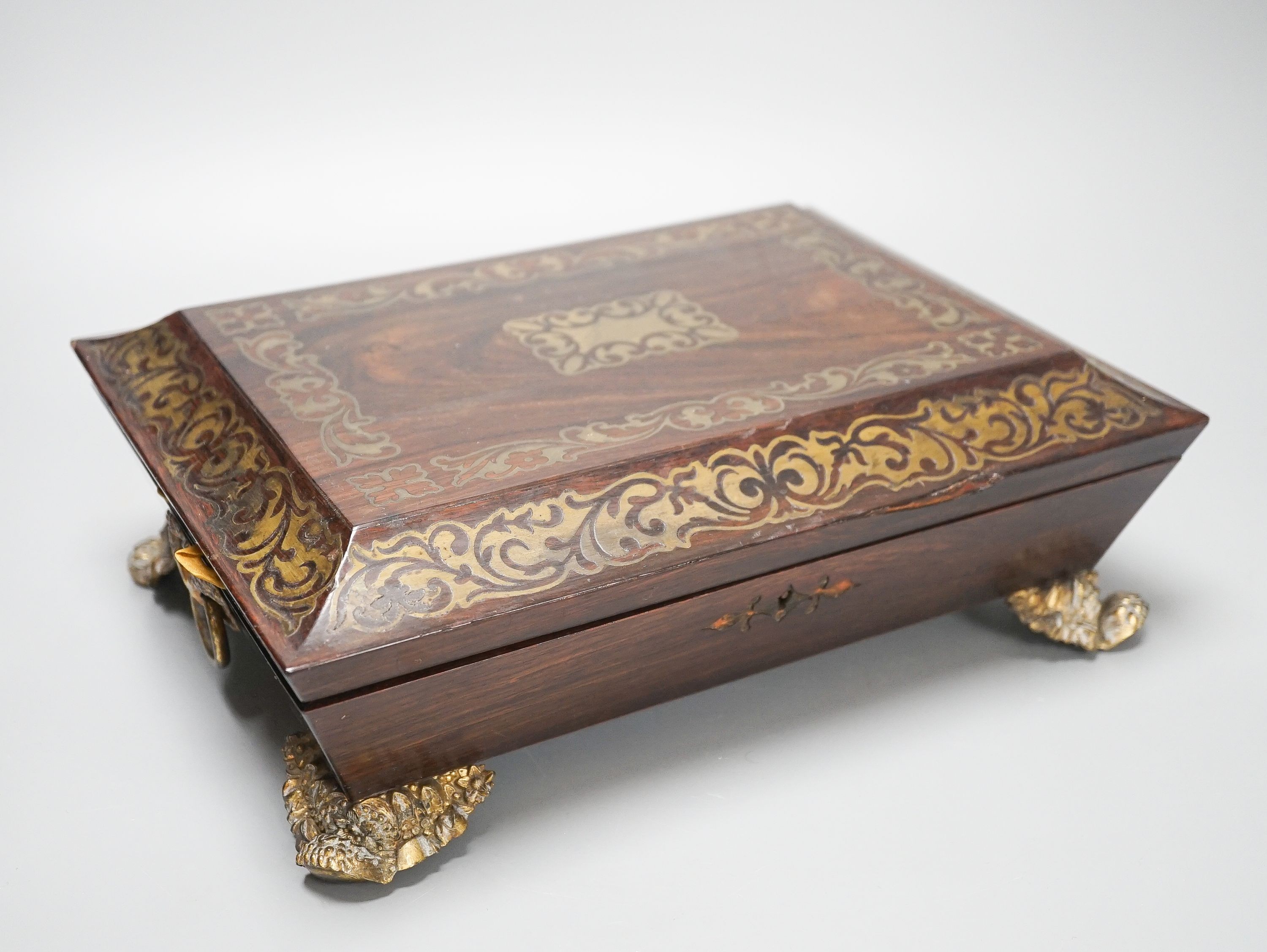 A William IV cut brass inlaid rosewood games box 30.5cm, containing Reynolds & Sons woodblock and stencil playing cards c.1830-50